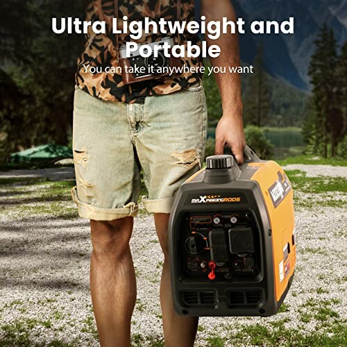 Person holding a portable generator in a scenic outdoor setting